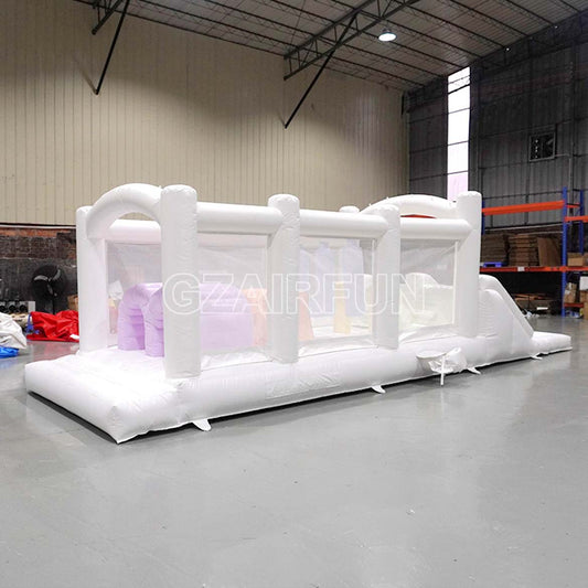 inflatable pastel color obstacle course with ball pit